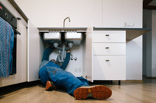Professional Drain Cleaning technician working in Monticello, GA